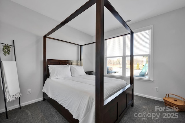 bedroom featuring carpet floors, visible vents, and baseboards