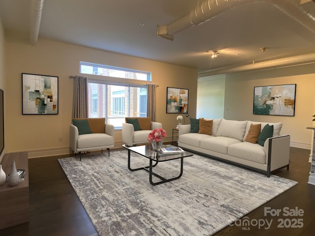 404 N Laurel Ave Unit 28, Charlotte, NC 28204 - living room featuring dark wood-style flooring and baseboards