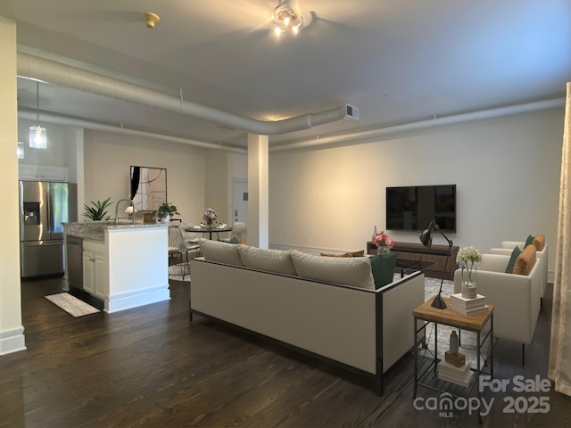 404 N Laurel Ave Unit 28, Charlotte, NC 28204 - living area featuring visible vents and dark wood-style flooring