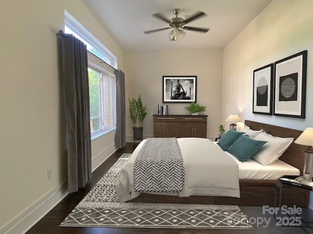 404 N Laurel Ave Unit 28, Charlotte, NC 28204 - bedroom with baseboards, a ceiling fan, and dark wood-style floors