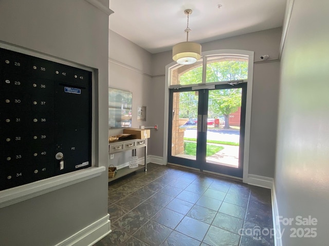 404 N Laurel Ave Unit 28, Charlotte, NC 28204 - doorway to outside featuring baseboards