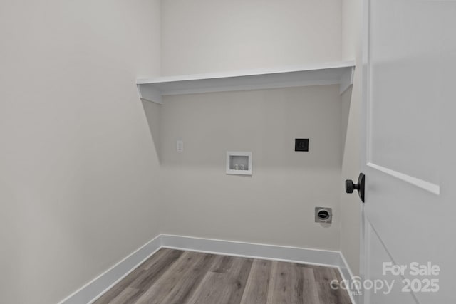 laundry room featuring laundry area, washer hookup, wood finished floors, baseboards, and electric dryer hookup