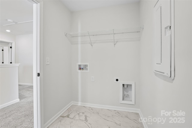 laundry room featuring laundry area, washer hookup, baseboards, marble finish floor, and electric dryer hookup