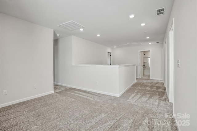 13729 Roderick Dr Unit 188, Huntersville, NC 28078 - spare room featuring visible vents, baseboards, recessed lighting, and light carpet