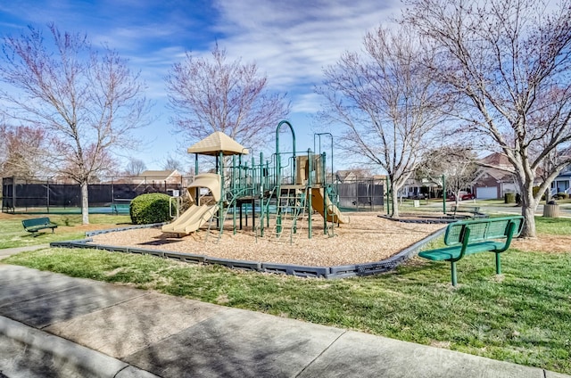 community playground featuring fence