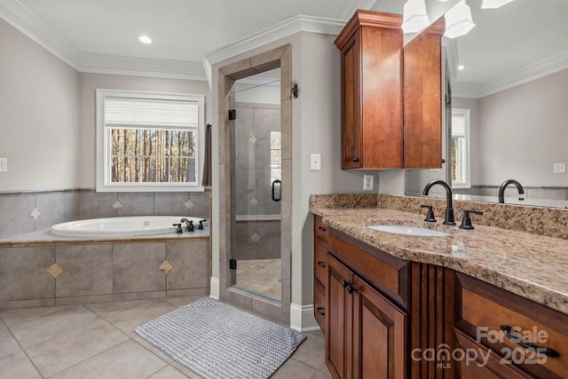 full bath featuring a garden tub, crown molding, a stall shower, vanity, and tile patterned flooring