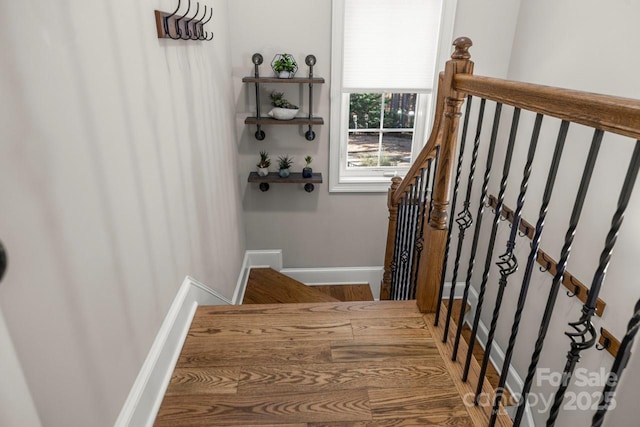 staircase with baseboards