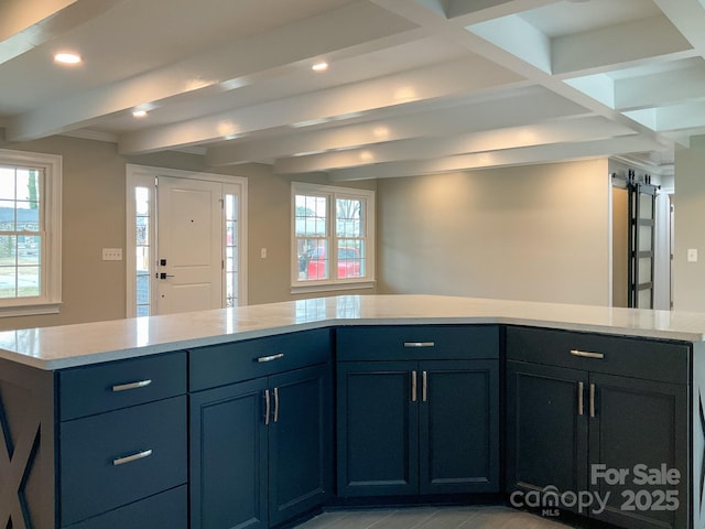 kitchen with open floor plan, light stone countertops, beam ceiling, and recessed lighting