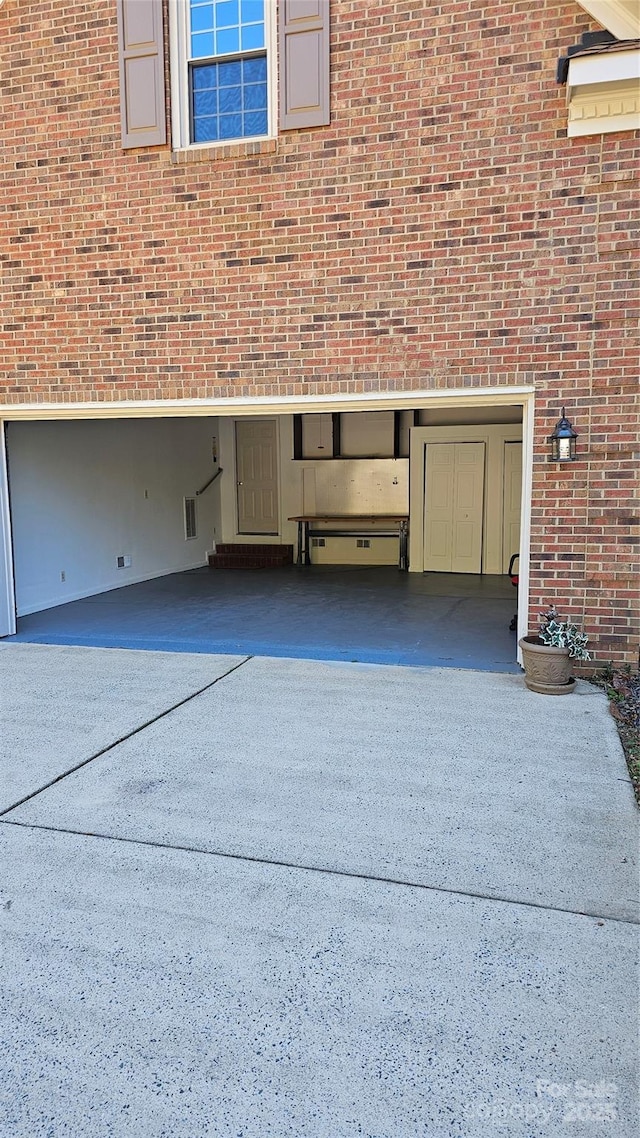 garage with driveway