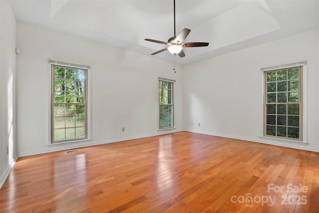 8731 Sheltonham Way, Charlotte, NC 28216 - unfurnished room with light wood-style floors and a ceiling fan