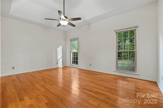 8731 Sheltonham Way, Charlotte, NC 28216 - unfurnished room featuring a ceiling fan and light wood-style floors