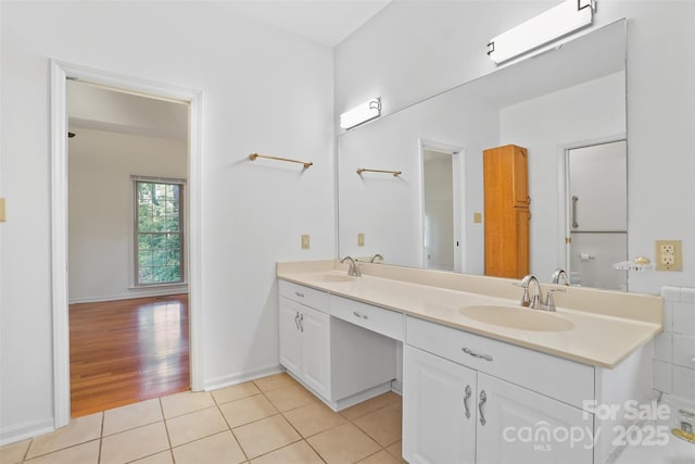 8731 Sheltonham Way, Charlotte, NC 28216 - bathroom featuring double vanity and tile patterned floors