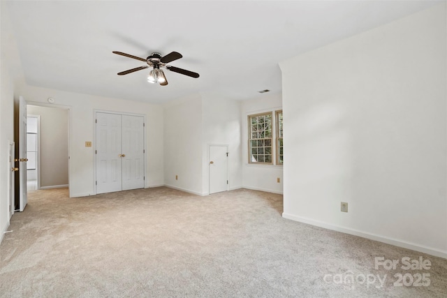 8731 Sheltonham Way, Charlotte, NC 28216 - unfurnished bedroom featuring light carpet and ceiling fan