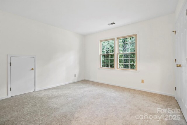 8731 Sheltonham Way, Charlotte, NC 28216 - carpeted spare room featuring baseboards