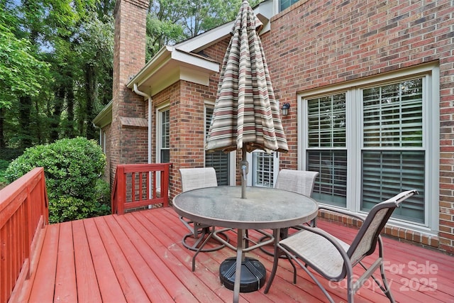 8731 Sheltonham Way, Charlotte, NC 28216 - wooden terrace featuring outdoor dining area