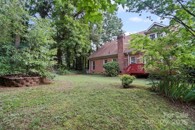 8731 Sheltonham Way, Charlotte, NC 28216 - view of grassy yard featuring a wooden deck