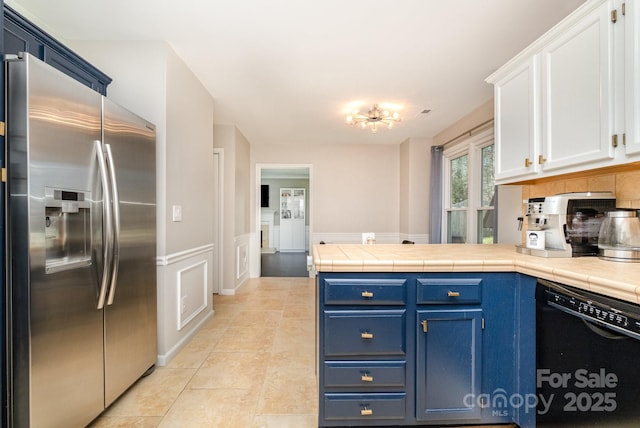 kitchen featuring blue cabinetry, white cabinets, dishwasher, a peninsula, and stainless steel fridge with ice dispenser