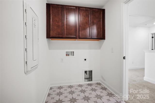 laundry room featuring hookup for an electric dryer, washer hookup, baseboards, cabinet space, and light floors