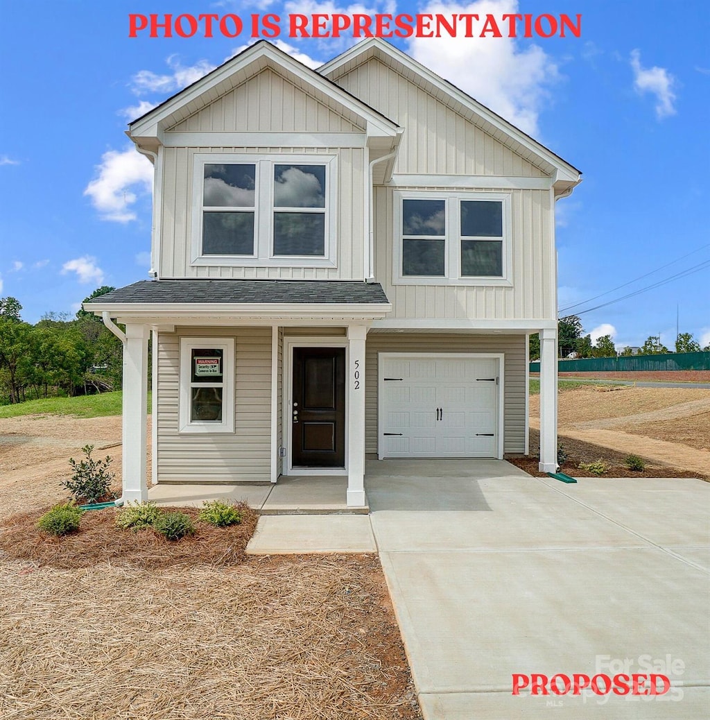 view of front facade with board and batten siding, covered porch, driveway, and an attached garage