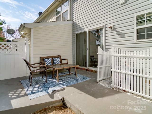 view of patio with fence