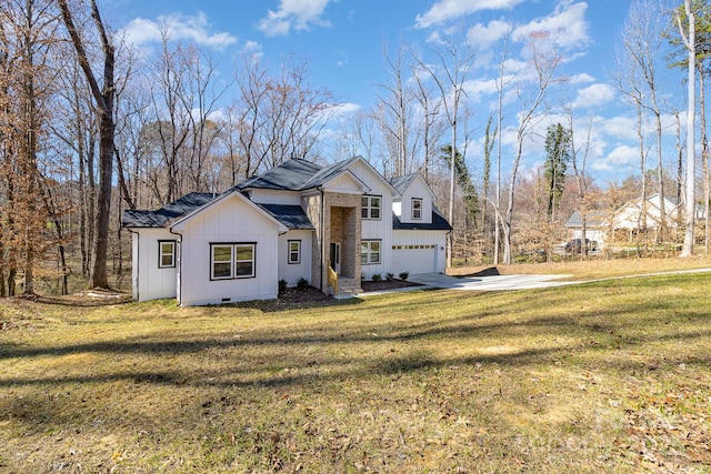 modern farmhouse featuring board and batten siding, crawl space, and a front lawn