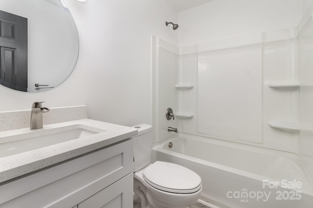 full bath with washtub / shower combination, vanity, and toilet