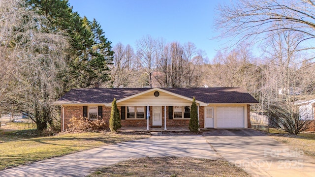 ranch-style home with a front lawn, brick siding, driveway, and an attached garage