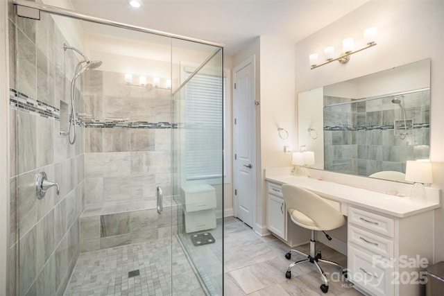 full bath featuring a shower stall and vanity