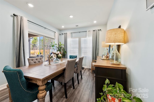 dining area with baseboards, visible vents, wood finished floors, and recessed lighting