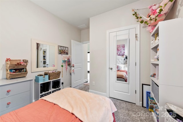 carpeted bedroom with visible vents