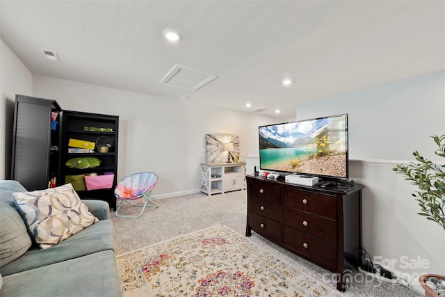 living area featuring recessed lighting, light colored carpet, visible vents, attic access, and baseboards