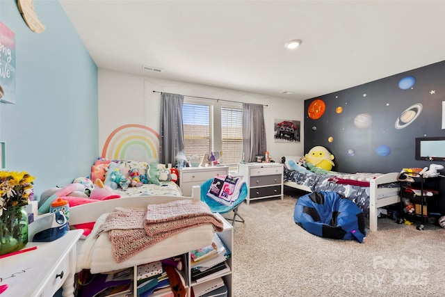 carpeted bedroom with visible vents