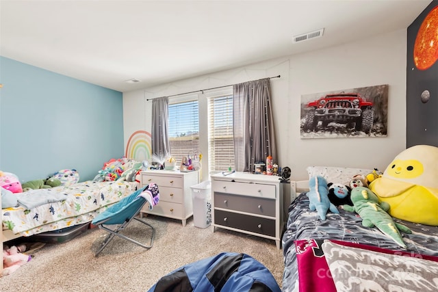 bedroom with carpet and visible vents