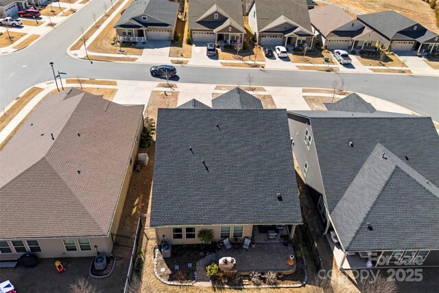 drone / aerial view with a residential view