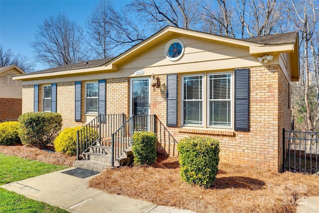 view of front facade featuring brick siding