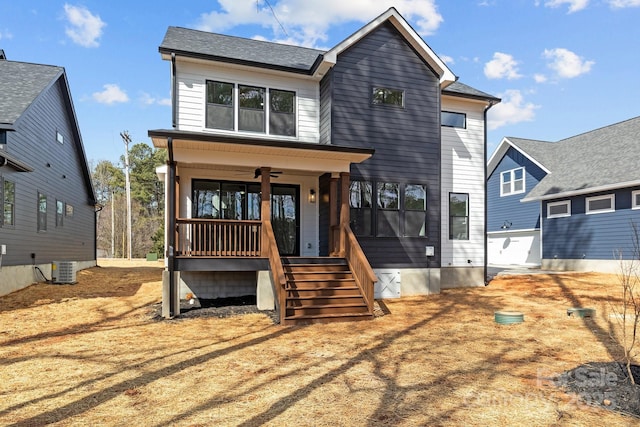 view of front of house with central air condition unit, covered porch, stairs, and a ceiling fan