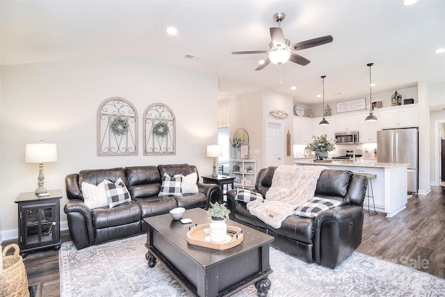 living area with visible vents, wood finished floors, recessed lighting, baseboards, and ceiling fan