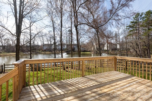 deck featuring a water view