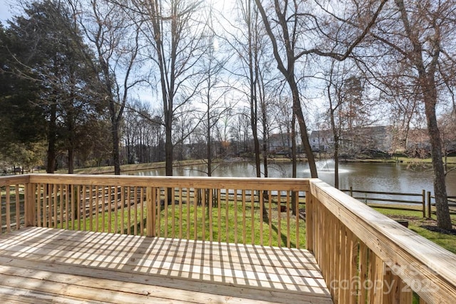 wooden terrace with a water view