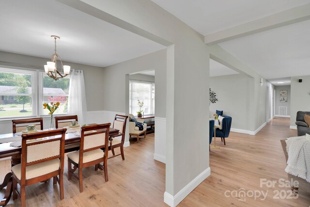 905 Blalock Dr, Kings Mountain, NC 28086 - dining area with a chandelier and light wood finished floors