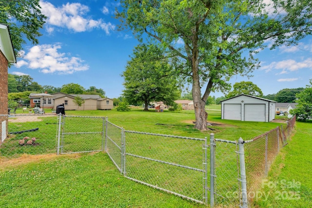 905 Blalock Dr, Kings Mountain, NC 28086 - fenced backyard with a gate, a garage, an outbuilding, and driveway
