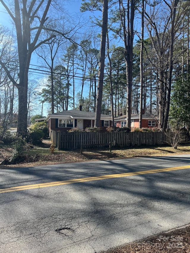 view of front of property with a fenced front yard