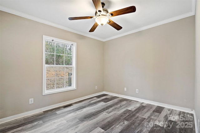 unfurnished room featuring visible vents, ornamental molding, wood finished floors, baseboards, and ceiling fan