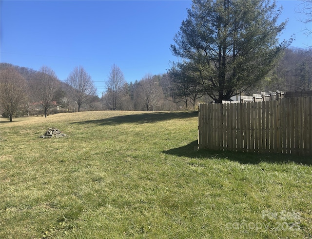 view of yard with fence