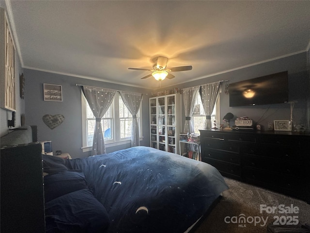 bedroom with carpet flooring and a ceiling fan