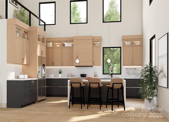 508 Hearthstone Way, Horse Shoe, NC 28742 - kitchen with light brown cabinets, light countertops, and a towering ceiling