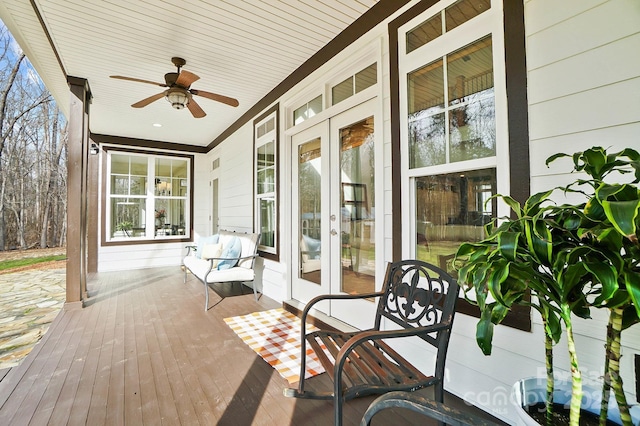 exterior space featuring a ceiling fan