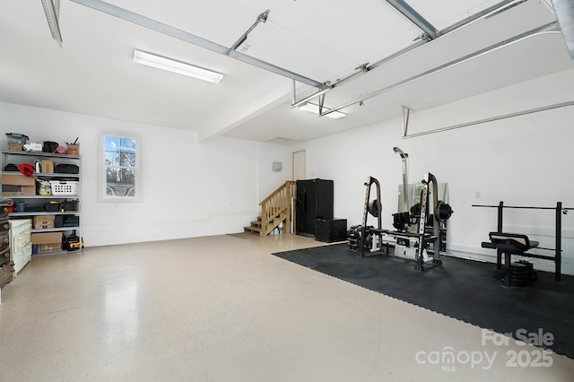 workout area featuring a garage