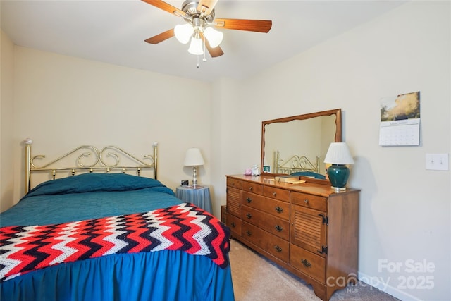 bedroom featuring carpet and a ceiling fan