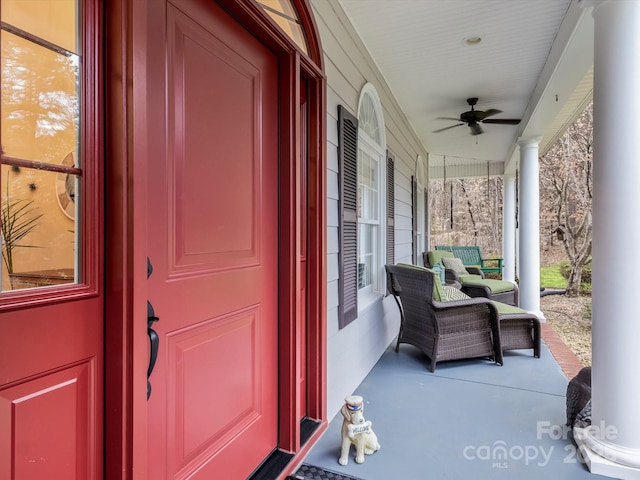 exterior space with ceiling fan